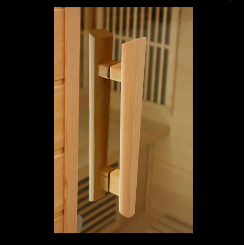 Wooden door handle on a wooden door with a blurred background