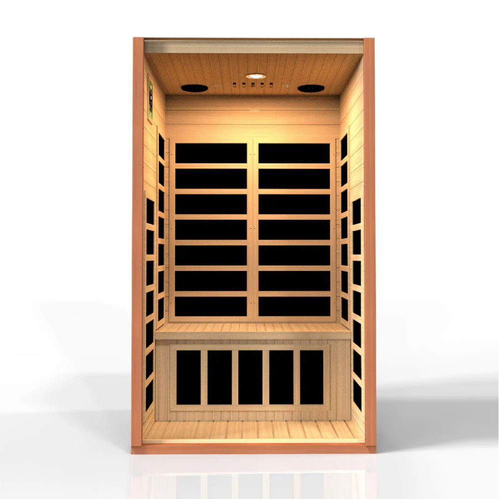 Infrared sauna with wooden interior and black panels on a white background