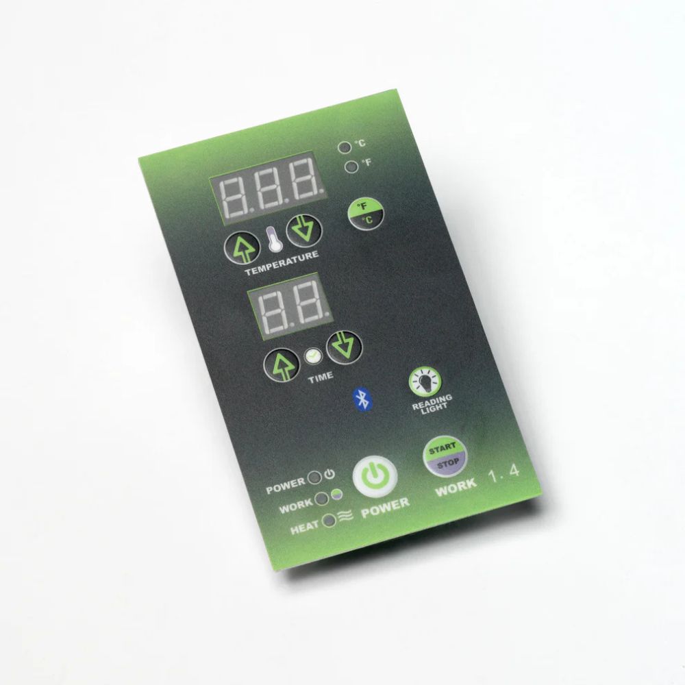 Control panel with digital display and various buttons on a white background