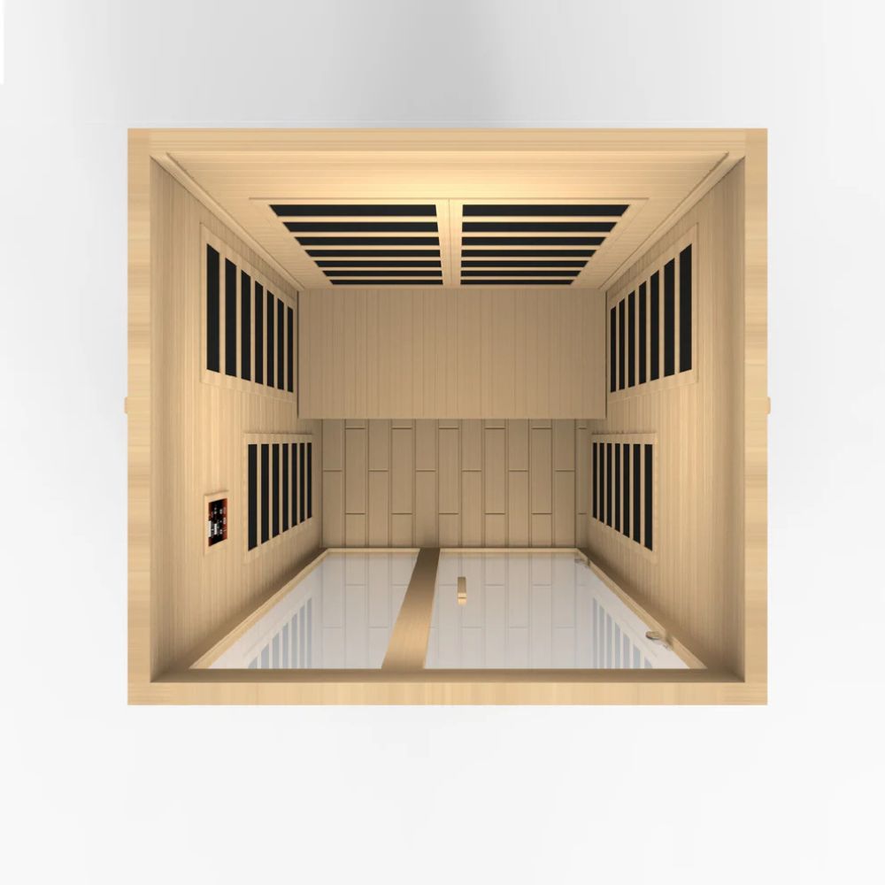 Sauna interior with wooden walls and ceiling, white floor, and black heating elements.