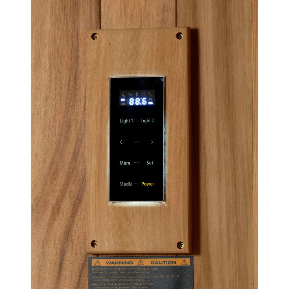 Wooden panel with electronic control panel on a wooden wall