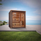 Wooden sauna with glass door on a patio with grass and blue sky background