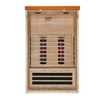 Infrared sauna with wooden interior and black heating elements on a white background