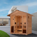 Wooden sauna cabin in an outdoor setting with a modern building in the background.