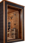 Infrared sauna with wooden interior and black exterior on a white background