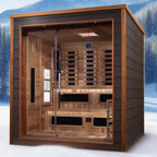 Wooden sauna with glass door in a snowy outdoor setting
