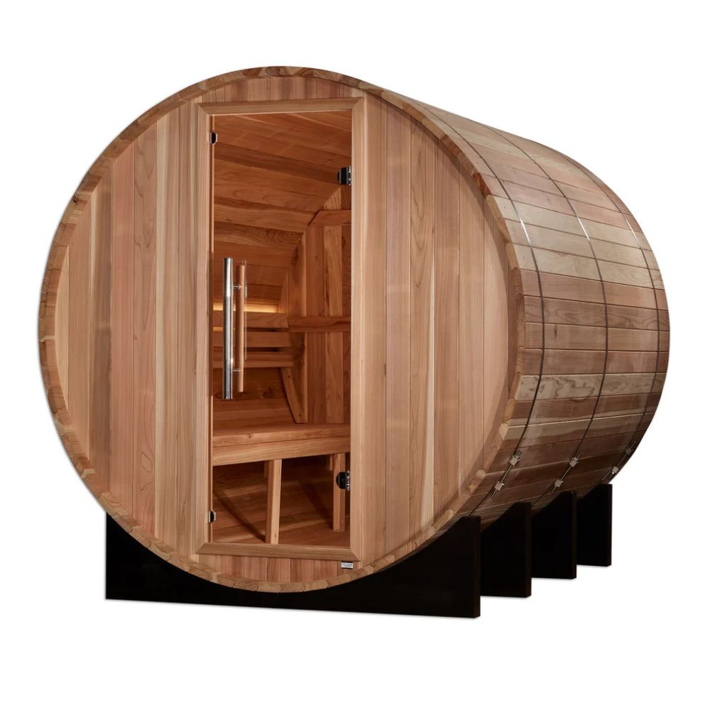 Wooden barrel sauna with open door on a white background