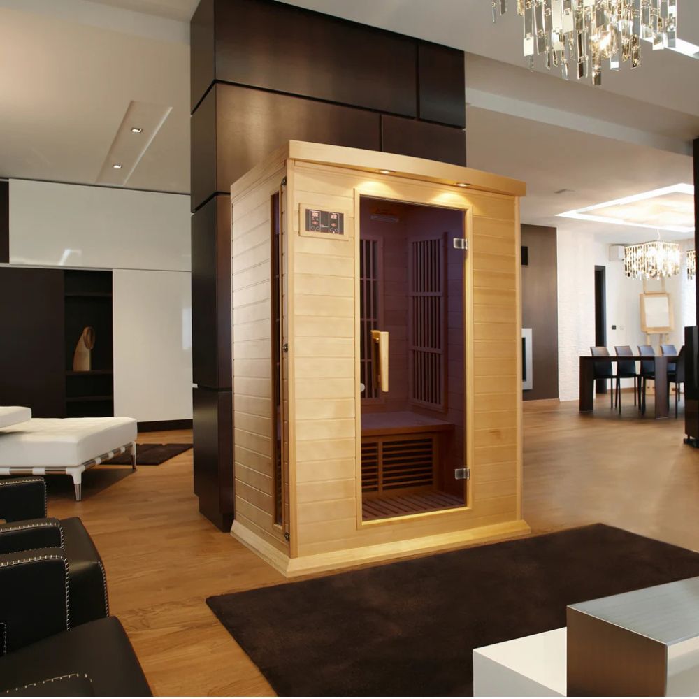 Infrared sauna in a modern living room setting with furniture and decor.