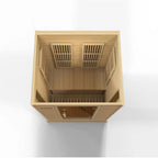 Wooden sauna with ventilation grilles on a white background