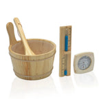 Wooden sauna bucket with ladle, thermometer, and ruler on a white background