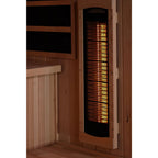 Wooden sauna with a glowing heater panel on a white background