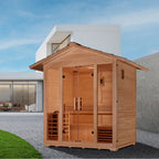 Wooden outdoor sauna with modern house in the background