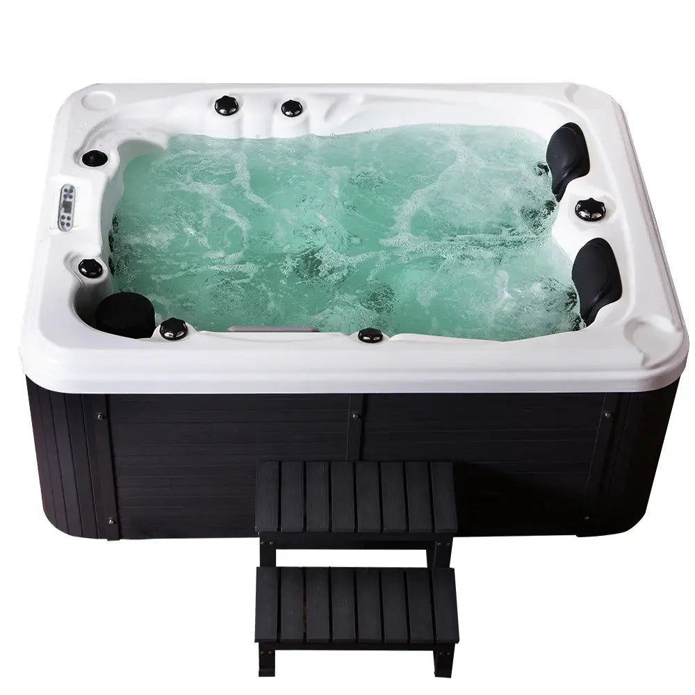 Hot tub with water and jets on a white background