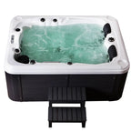 Hot tub with water and jets on a white background