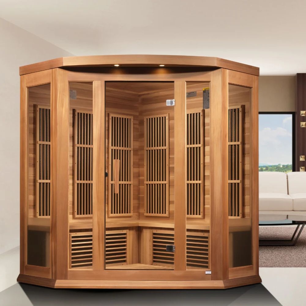 Wooden infrared sauna in a room with a couch and window