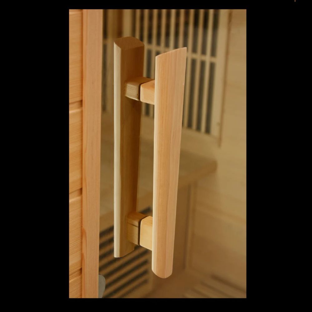 Wooden door handle on a wooden door with a blurred background