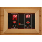 Digital control panel with temperature and timer display on a wooden background