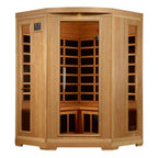 Wooden infrared sauna with glass door on a white background
